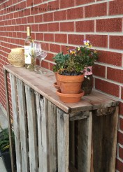 Add storage and interest to your summer gathering place with this easy DIY Pallet Patio Bar.