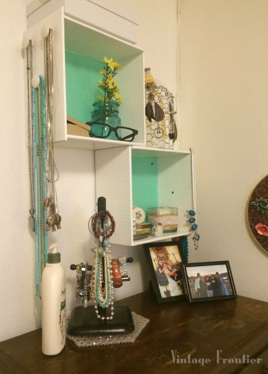 Re-purpose old dresser drawers for storage on vertical wall space. 