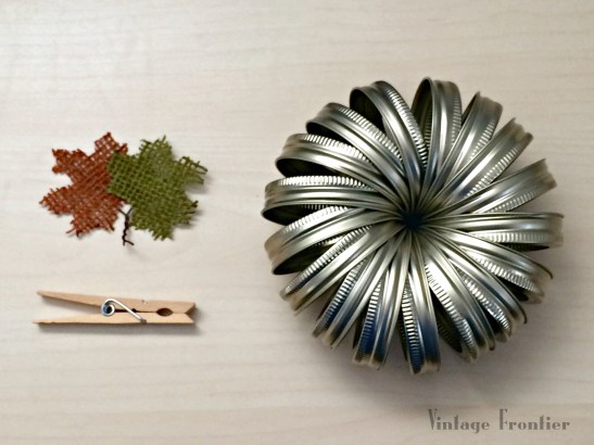 Mason Jar Lids come together quickly to form cute little pumpkins perfect for your fall decor.