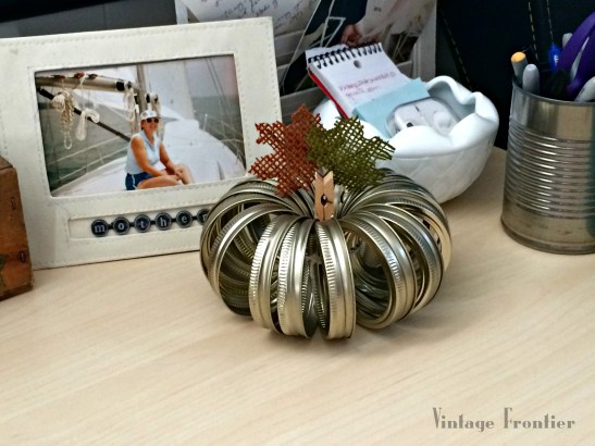 Mason Jar Lids come together quickly to form cute little pumpkins perfect for your fall decor.